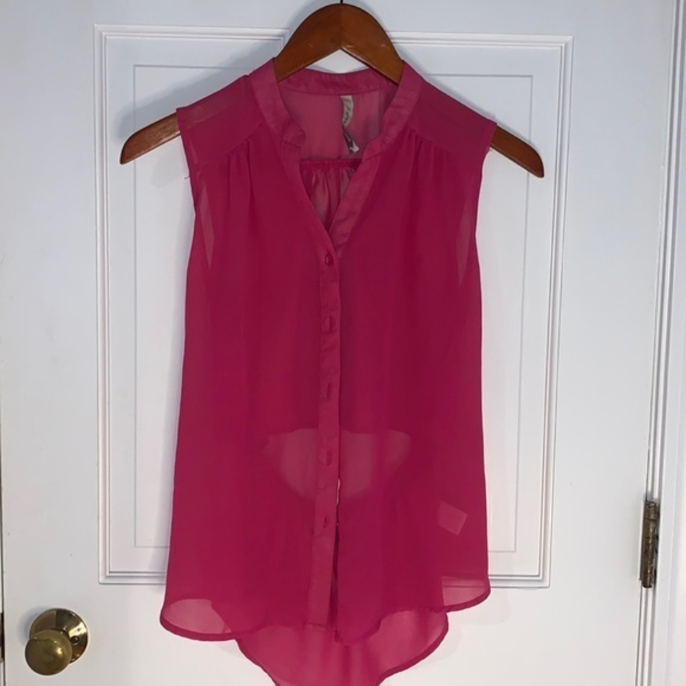 Pink sheer top cut out in the back
